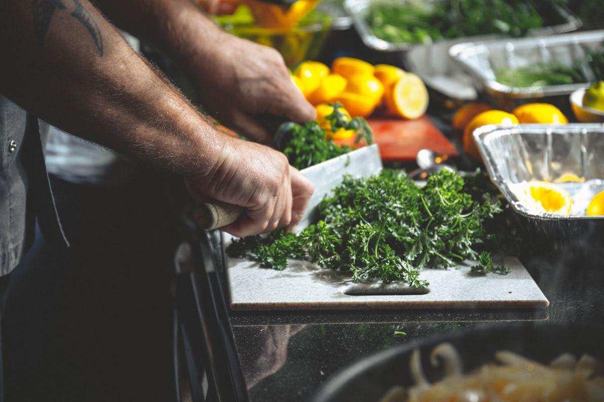 Man enjoying balanced meal with fresh vegetables and proteins